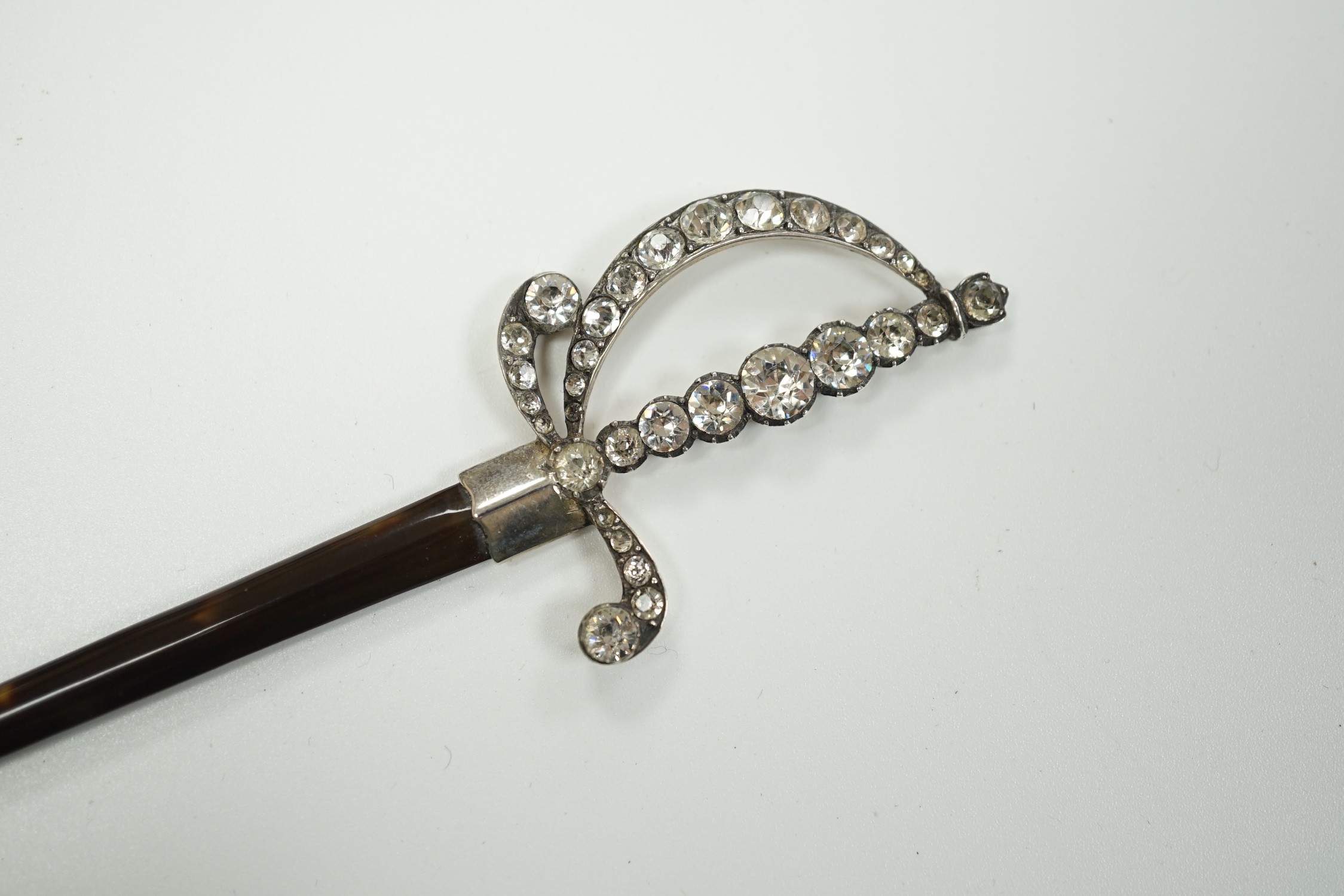 An early 20th century white metal and paste mounted tortoiseshell model of a court sword, 17.7cm, in fitted case.